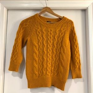 Orange cable sweater